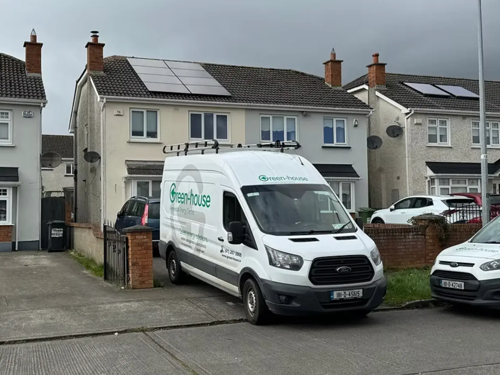 BrightPeak Energy van outside a home with solar panels